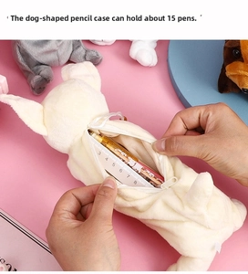 Detail view of plush dog pencil case showing zipper opening and capacity for 15 pens