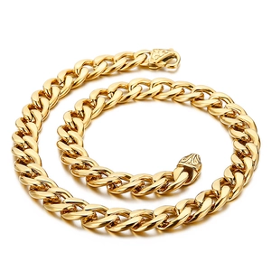 Detailed view of a golden stainless steel Cuban link necklace with a polished finish
