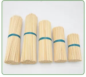 Five bundles of natural carbonized bamboo BBQ skewers in various lengths for grilling