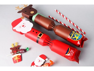 Creative Christmas candy boxes featuring Santa and reindeer themes for festive gift wrapping