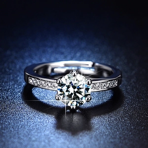 Macro detail of six-prong solitaire ring with brilliant diamond and adjustable band