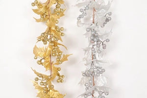 Detailed view of gold and silver Christmas glitter berry stems for festive decor