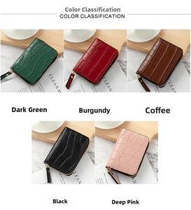 Detail view of mini crocodile pattern card holders in dark green, maroon, coffee and black