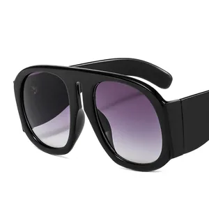 Oversized black frame sunglasses with purple gradient lenses in a trendy 45-degree view