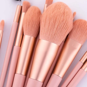 10-piece soft pink makeup brush set with synthetic bristles and rose gold ferrule