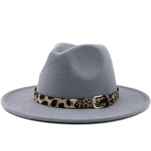 Detail of grey wool fedora hat featuring a stylish leopard print belt and silver buckle