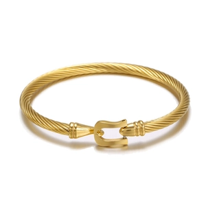 Men's gold twisted rope bracelet in stainless steel with horseshoe buckle and polished finish