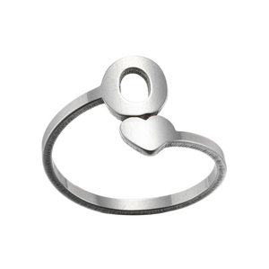 Detail of silver stainless steel ring with alternating hollow circles and heart shapes