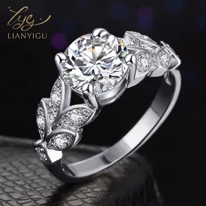 Elegant leaf-shaped engagement ring with round zircon four-claw setting in silver tone