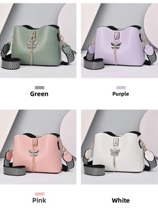 Bowshell handbags in four colors with wide herringbone woven shoulder straps
