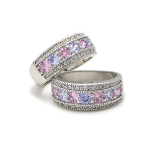 Luxurious silver wedding band set with pink and purple zircons and milgrain detailing
