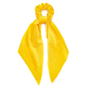 Yellow velvet scrunchie with long scarf tails shown on a clean white background