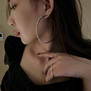 Elegant large gold hoop earrings with white crystals and matching chain ring for women