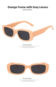 Detail view of retro rectangle orange pink frame sunglasses with grey lenses