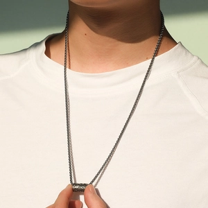 Men's stainless steel cylindrical pendant necklace with detailed totem engravings