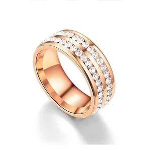 Polished rose gold titanium steel ring featuring double rows of sparkling clear crystals