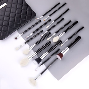 13-piece professional makeup brush set with elegant black quilted storage pouch