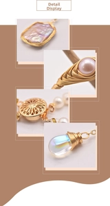 Detail showing handcrafted baroque pearl earrings with golden wire wrap and crystal droplet