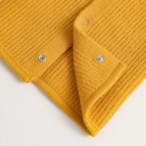 Yellow knitted neck gaiter with silver buttons and classic ribbed texture design