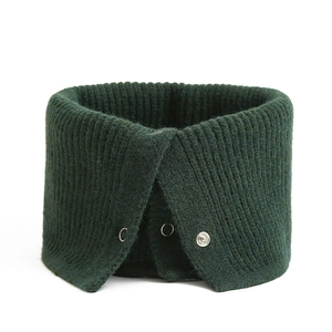 Macro shot of dark green knitted neck gaiter with three metal snap buttons and texture