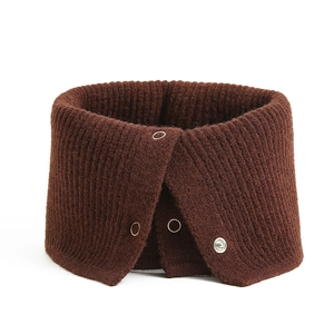 Close-up of a dark brown ribbed knit neck warmer with metal snap button closures