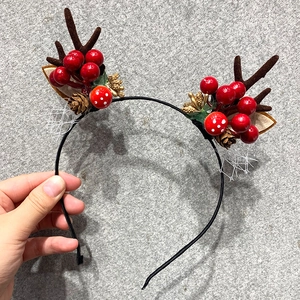 Christmas reindeer antler headband with red berries, pine cones and mesh on black wire