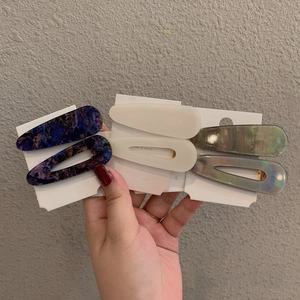 6-piece acrylic hair clip set in marble blue, creamy white, and iridescent green