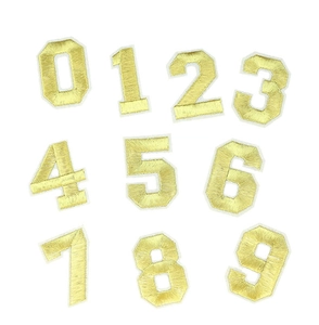 Detailed embroidery texture of gold number patches 0-9 for uniforms and apparel