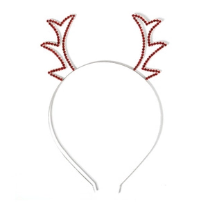 Detail of silver headband featuring reindeer antlers with red rhinestones and glittery finish