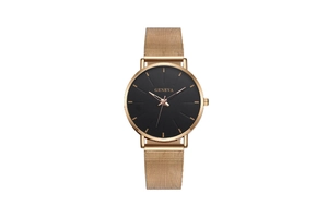 Detail of rose gold mesh strap and minimalist black dial on Geneva quartz watch