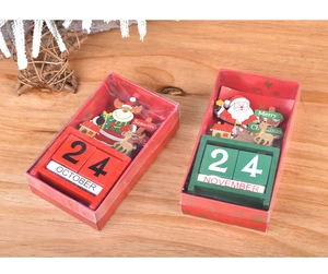 Detailed view of two festive wooden Christmas countdown calendars with Santa and reindeer