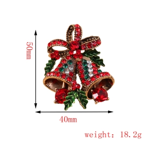 Vintage Christmas double bell brooch with red crystals and green enamel leaves
