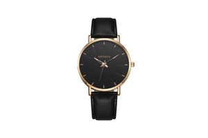 Close-up of Geneva watch with rose gold case, black dial and textured leather strap
