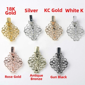 Detailed view of hollowed metal clips in seven metallic finishes for DIY hair accessories