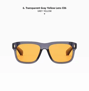 Detail of transparent grey frame sunglasses with yellow lenses and metallic hinges