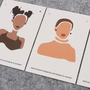 Minimalist black round stud earrings displayed on modern illustrated jewelry cards