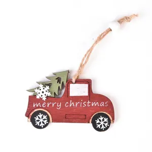 Rustic wooden Christmas truck ornament with a green tree and merry christmas engraving