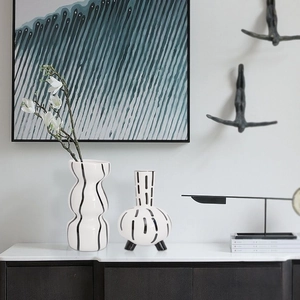 Modern ceramic vases set with hand-painted black and white abstract patterns