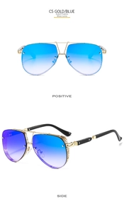 Detail of C5 gold metal frame aviator sunglasses with gradient blue lenses and mesh temple