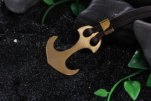 Macro shot of 316L stainless steel anchor pendant with brushed metal finish detail