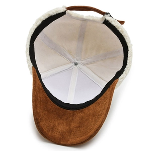 Inside view of warm baseball cap with brown suede finish and white sherpa lining detail
