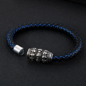 Men's black braided leather skull bracelet with blue stitching and silver magnetic clasp