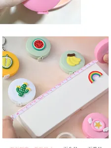Detail showing various cute cartoon portable tape measures with 150cm scale and soft ribbon