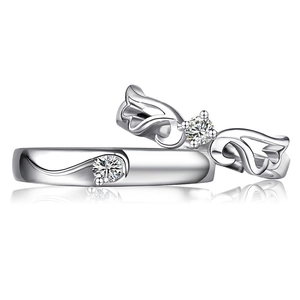 Elegant silver angel wings couple ring set with sparkling zircons and polished finish