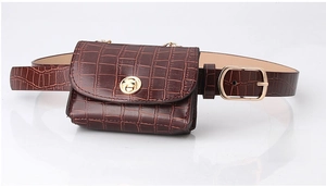 Detail of coffee crocodile pattern waist bag with gold swivel clasp and belt