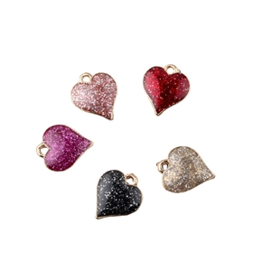 DIY glitter heart pendants in five colors for jewelry making with gold-tone loops