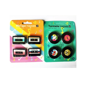 Detailed view of retro mixtape and vinyl record fridge magnets in retail packaging