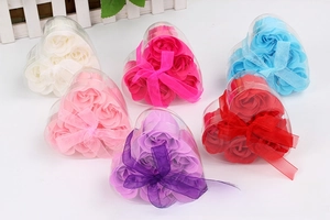 Macro shot of 6-piece rose soap flower sets in heart-shaped transparent gift boxes