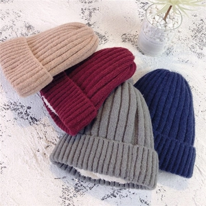 Fleece lined winter knit beanies for men and women in various solid colors