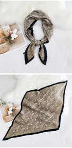 Champagne gold paisley pleated scarf with black wavy edges and vintage pattern
